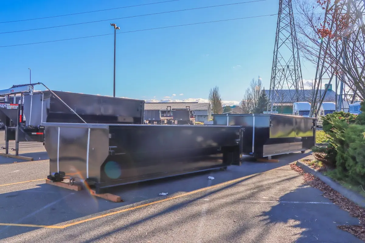 Roll-off dumpster ready for waste disposal at job site for Concrete Dumpster Rental in Hornsby Bend